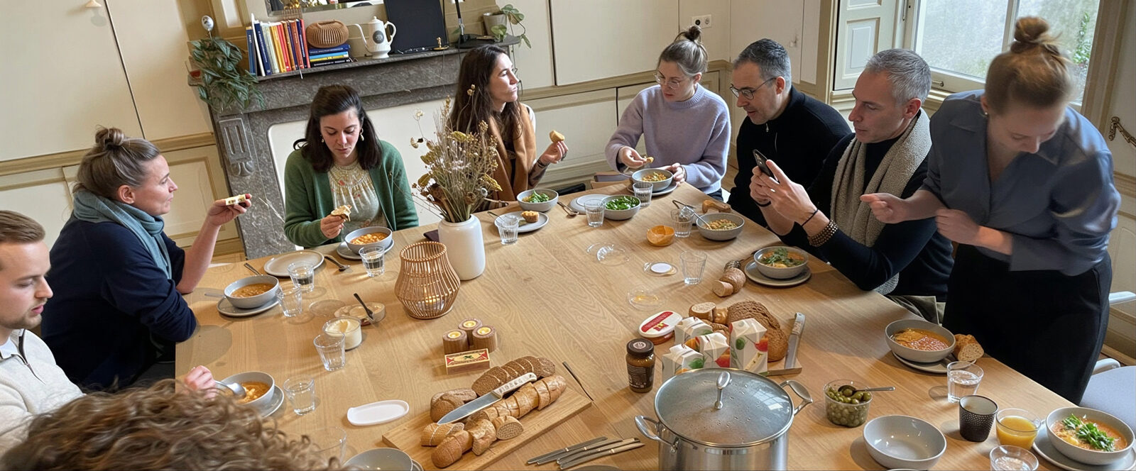 People around a shared table, connection and shared humanity